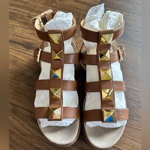 Michael Kors gladiator sandals.
